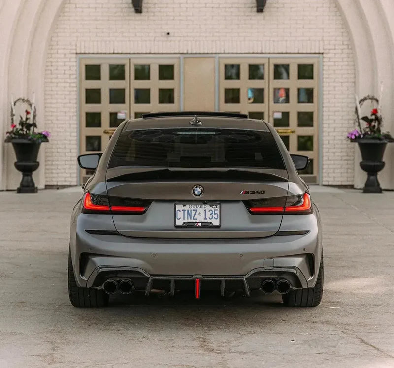 BMW G20 LCI Carbon Fiber/ Gloss Black Rear Diffuser with Integrated Brake Light (2023+)